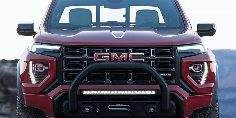 A 2025 GMC Canyon from the front grille parked in Bryant, AR 