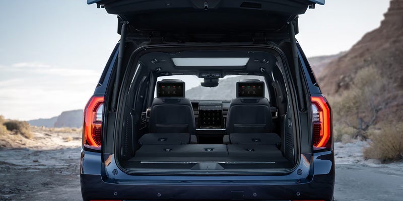 2026 GMC Yukon XL cargo area and rear storage space in Bryant, AR