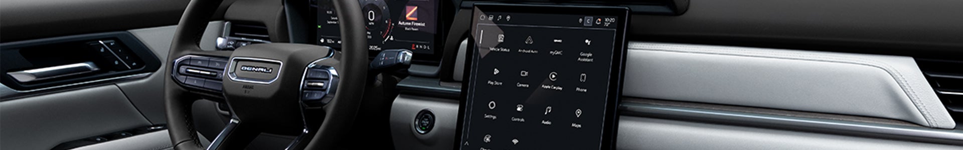 2027 GMC Terrain dashboard with 15-inch infotainment touchscreen, digital driver display, and partial steering wheel view in Bryant, AR.