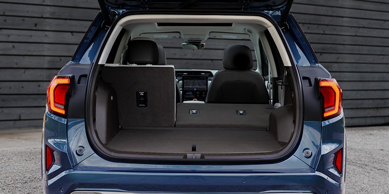 2027 GMC Terrain with rear liftgate open, showcasing its spacious cargo area and flexible storage in Bryant, AR.